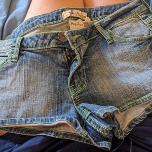 Light Jean Shorts With Light Lime Green Stitching.